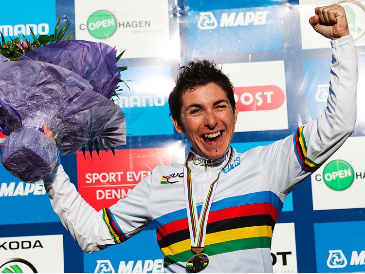 Giorgia Bronzini exults on the podium with her second gold medal in the Women's Elite Road Race competition. (Jonathan Nackstrand/AFP/Getty Images) Giorgia Bronzini exults on the podium with her second gold medal in the Women's Elite Road Race competition. (Jonathan Nackstrand/AFP/Getty Images)