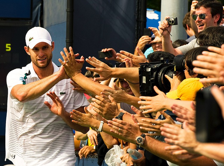Andy Roddick high-fives his fans after winning his way back into the US open semifinals for the first time since 2008. (Don Emmert/AFP/Getty Images) Andy Roddick high-fives his fans after winning his way back into the US open semifinals for the first time since 2008. (Don Emmert/AFP/Getty Images)