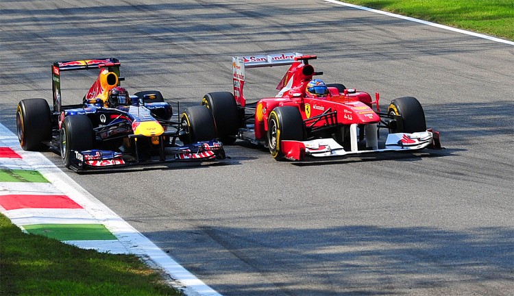 Sebastian Vettel (L) moves to pass Fernando Alonso on lap five of the Formula One Italian Grand Prix. (Giuseppe Cacace/AFP/Getty Images) Sebastian Vettel (L) moves to pass Fernando Alonso on lap five of the Formula One Italian Grand Prix. (Giuseppe Cacace/AFP/Getty Images)