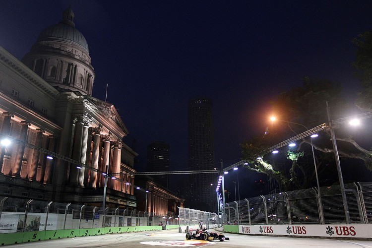 Sebastian Vettel of Red Bull drives during final practice for the Formula One Singapore Grand Prix. The race will start at dusk and finish under the lights. (Chris McGrath/Getty Images for SSC) Sebastian Vettel of Red Bull drives during final practice for the Formula One Singapore Grand Prix. The race will start at dusk and finish under the lights. (Chris McGrath/Getty Images for SSC)