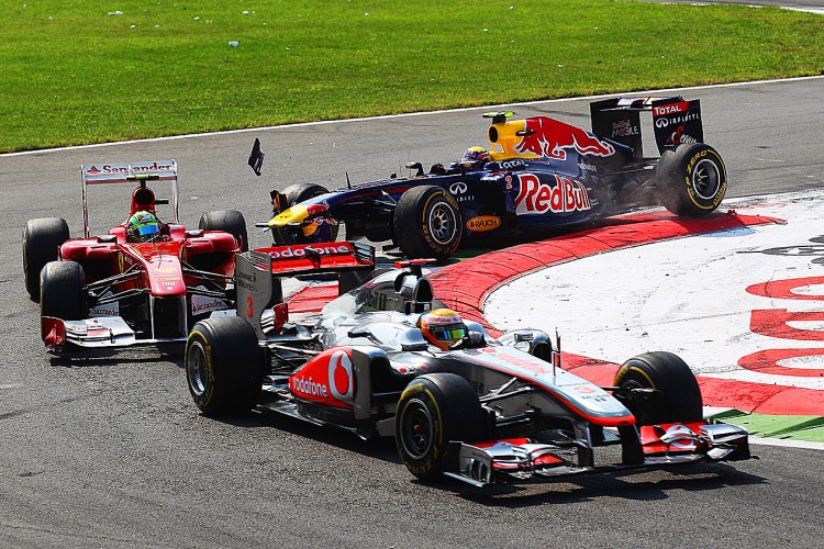 Mark Webber (rear) clips the rear of Felipe Massa (L) and damages the Red Bull's front wing during the Formula One Italian Grand Prix. (Mark Thompson/Getty Images) Mark Webber (rear) clips the rear of Felipe Massa (L) and damages the Red Bull's front wing during the Formula One Italian Grand Prix. (Mark Thompson/Getty Images)
