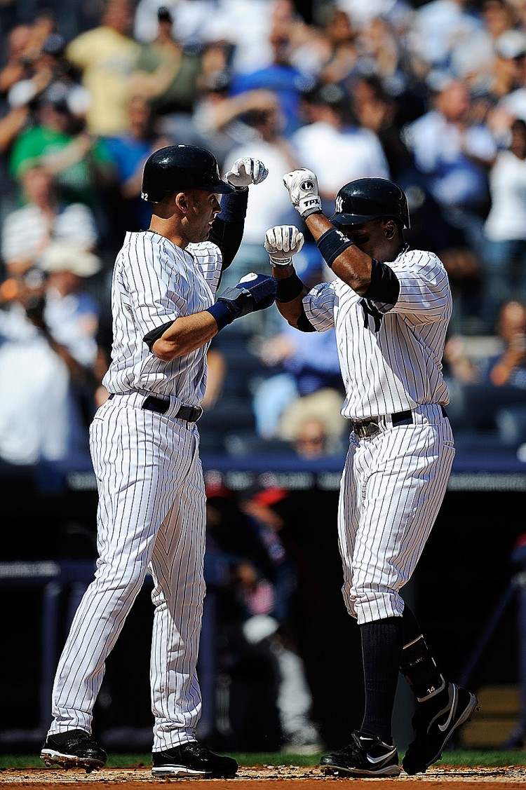 TWO ON THE BOARD: Curtis Granderson's 41st home run, a two-run shot off Twins' starter Scott Diamond, scored a congratulatory Derek Jeter to put the Bombers up 2-0 in the first. (Patrick Mcdermott/Getty Images) TWO ON THE BOARD: Curtis Granderson's 41st home run, a two-run shot off Twins' starter Scott Diamond, scored a congratulatory Derek Jeter to put the Bombers up 2-0 in the first. (Patrick Mcdermott/Getty Images)