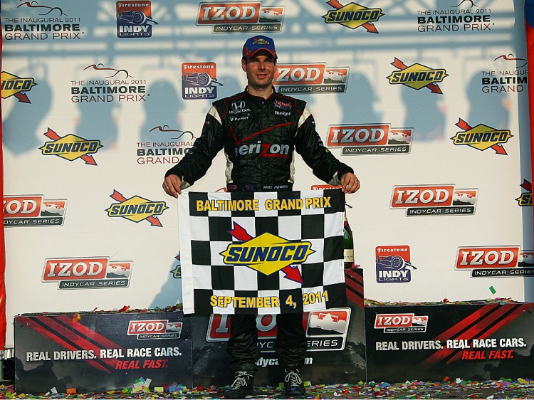 Will Power holds the checkered flag in Victory Lane after winning the IndyCar Baltimore Grand Prix. (Chris Jones/IndyCar.com) Will Power holds the checkered flag in Victory Lane after winning the IndyCar Baltimore Grand Prix. (Chris Jones/IndyCar.com)