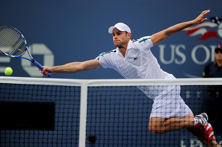 NET PLAY: Andy Roddick returns a shot to Julien Benneteau of France during their third-round match at the US Open. (Stan Honda/AFP/Getty Images) NET PLAY: Andy Roddick returns a shot to Julien Benneteau of France during their third-round match at the US Open. (Stan Honda/AFP/Getty Images)