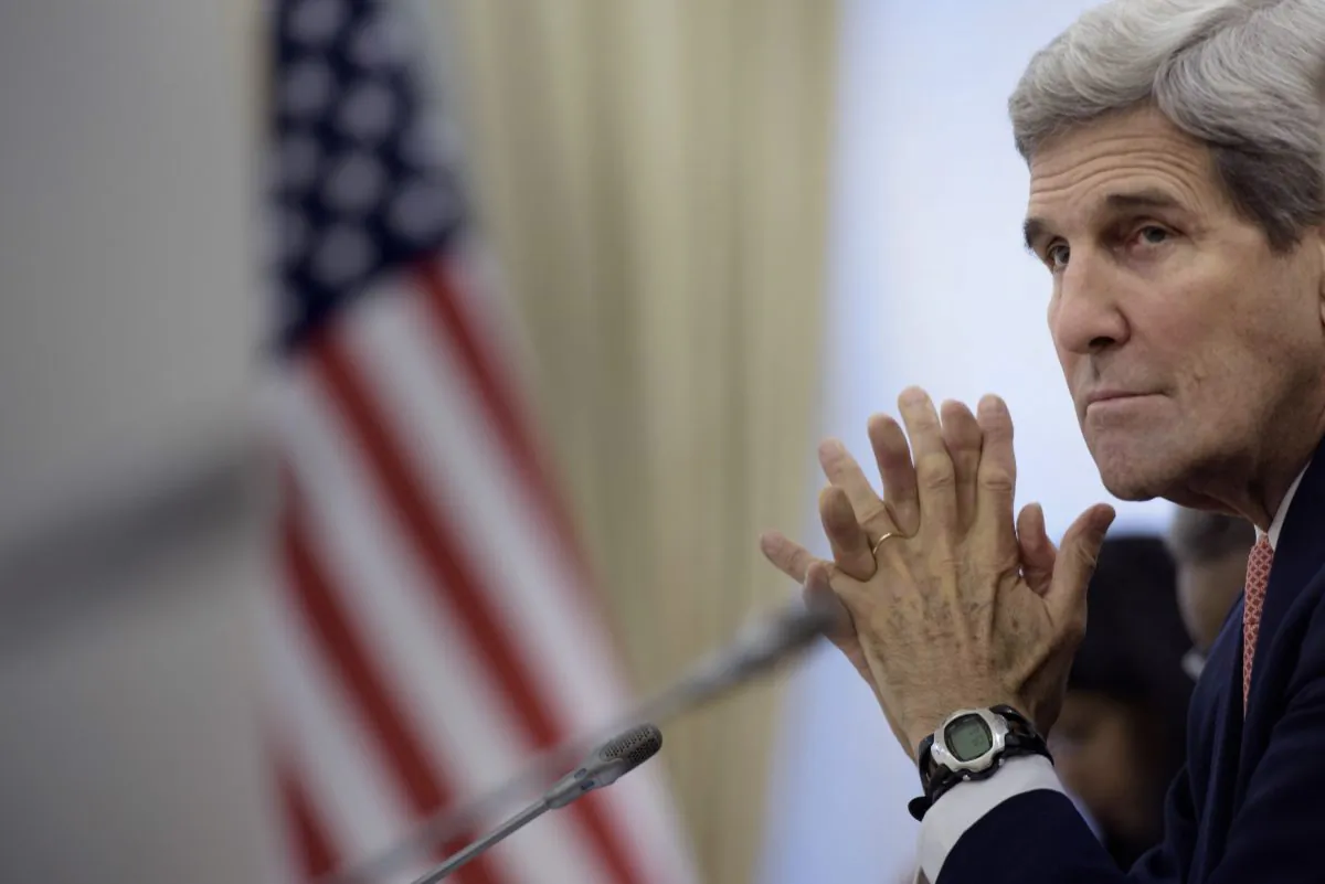 U.S. Secretary of State John Kerry looks on while Uzbek President Islam Karimov makes an opening statement before a meeting at the Palace of Forums on the President's Residential Compound in Samarkand, Uzbekistan Sunday, Nov. 1, 2015. (Brendan Smialowski/AP)