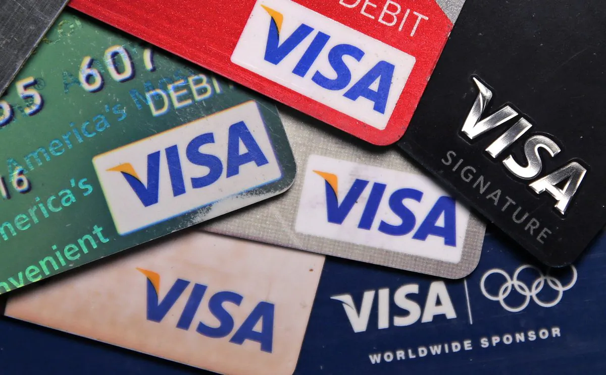 File photo shows a selection of Visa cards in Boston, on June 4, 2014. (AP Photo/Charles Krupa)