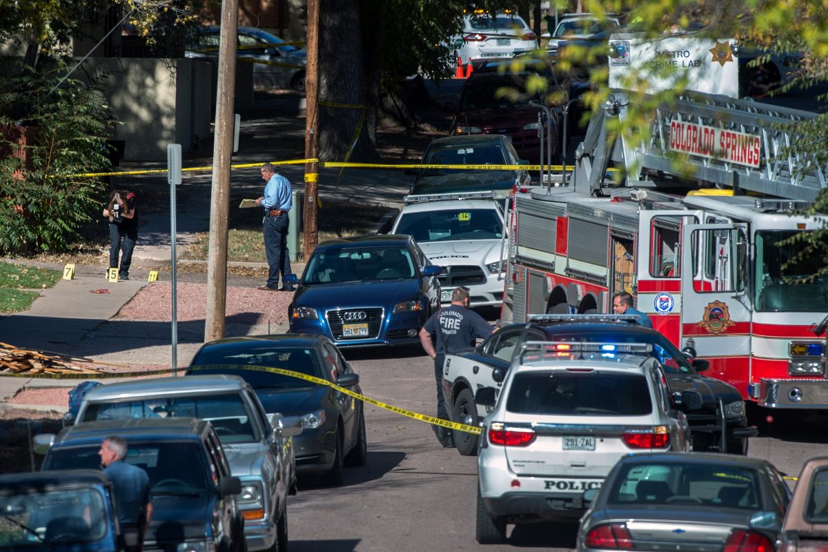 Police investigate the scene after a shooting in Colorado Springs, Colo., on Oct. 31, 2015. Multiple are dead, including a suspected gunman, following a shooting spree according to authorities. Lt. Catherine Buckley said the crime scene covers several major downtown streets. (Christian Murdock/The Gazette via AP)