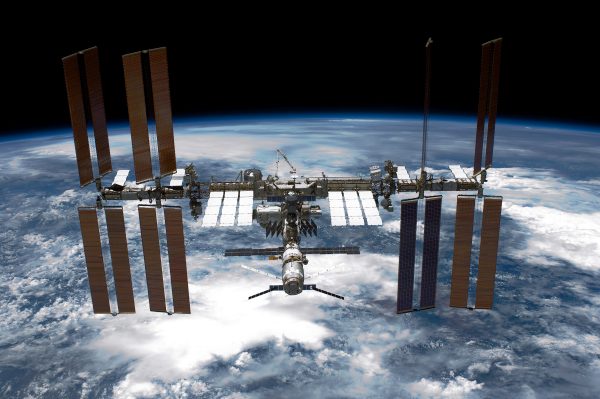 Back dropped by planet Earth the International Space Station (ISS) is seen from NASA space shuttle Endeavour after the station and shuttle began their post-undocking relative separation in space, on May 29, 2011. (NASA via Getty Images)