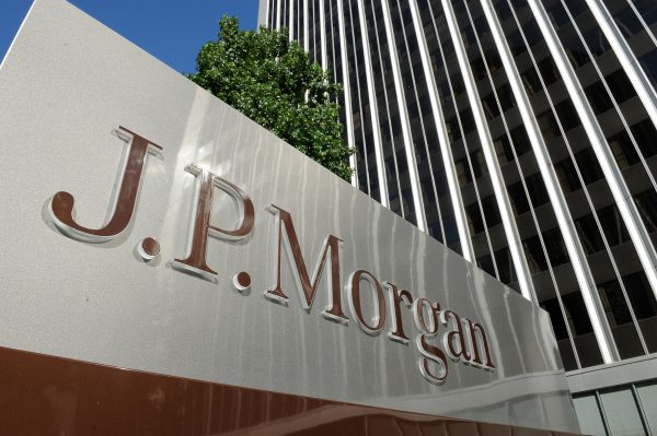 A JPMorgan Chase sign is seen outside the office tower housing the financial services firm's Los Angeles, Calif., offices, on Aug. 8, 2013. (Robyn Beck/AFP/Getty Images)