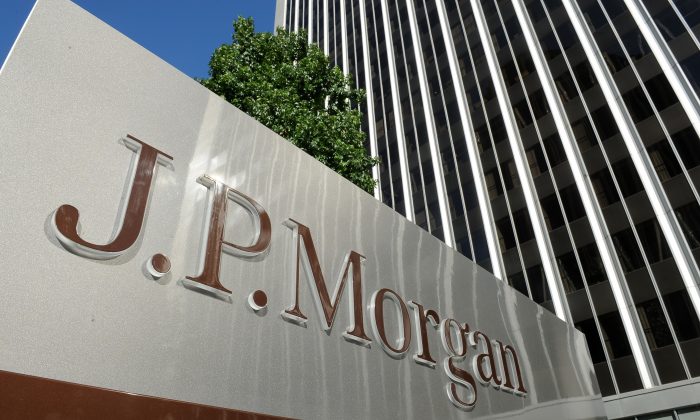 A JPMorgan Chase sign is seen outside the office tower housing the financial services firm's Los Angeles, Calif., offices, on Aug. 8, 2013. (Robyn Beck/AFP/Getty Images)