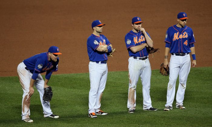 Mets infielders (L-R) Lucas Duda, David Wright, Daniel Murphy, and Wilmer Flores came up short in their bid to win the World Series but their run isn't over. (Doug Pensinger/Getty Images)