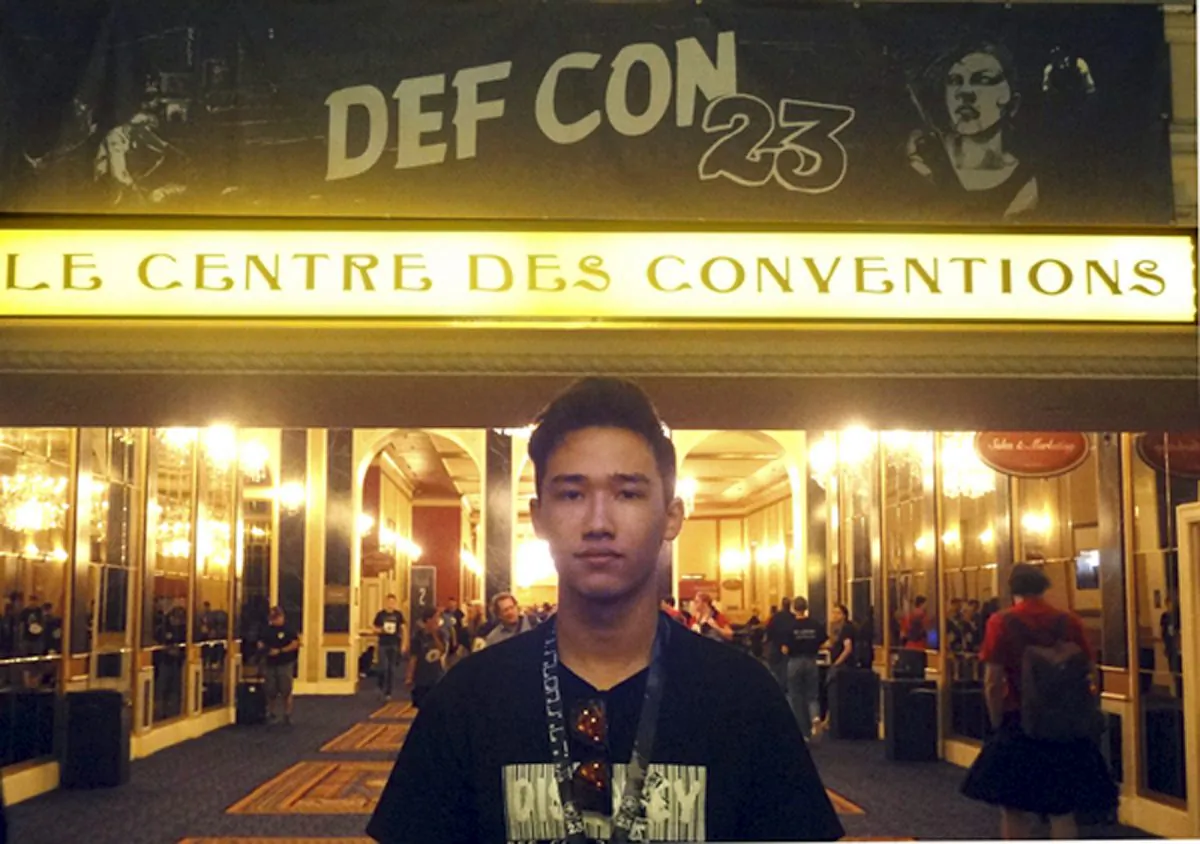 This August 2014 photo provided by Shu Chien shows her son Moshe Kai Cavalin at the DEF CON 23 hacker's conference in Las Vegas. (Shu Chien via AP)