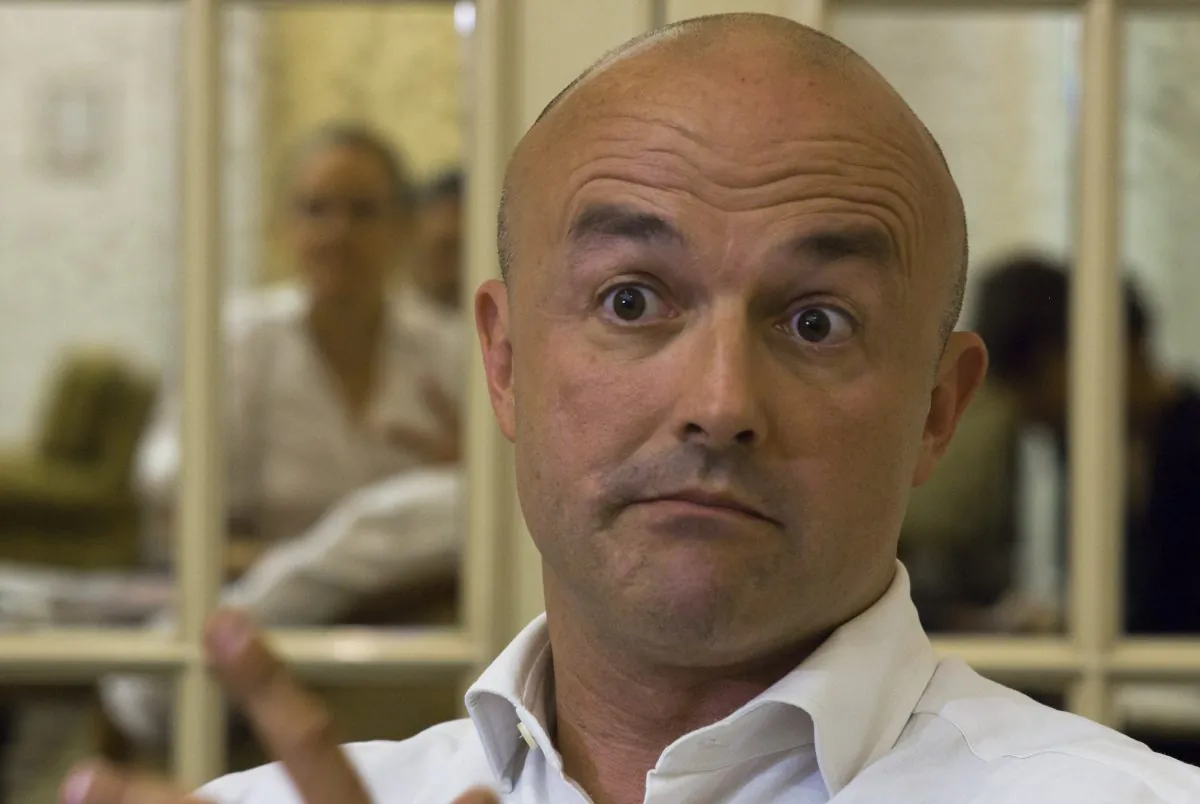Gianluigi Nuzzi, the investigative journalist who published a book of leaked papal documents, is portraited during an interview with the Associate Press, in Rome, on May 30, 2012. A new book about the Vatican by Nuzzi is due out on the Italian bookstores Nov. 5. (AP Photo/Domenico Stinellis)