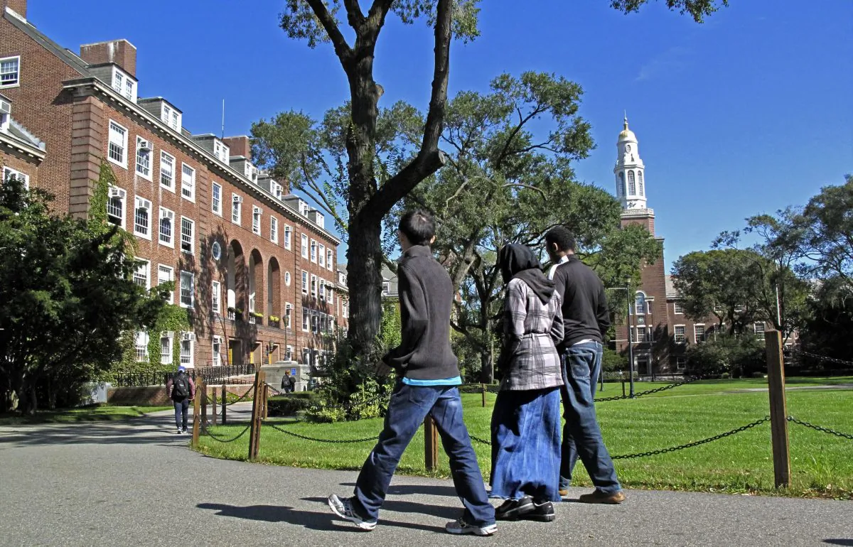 People walk on the campus of Brooklyn College in Brooklyn, New York, on Oct. 7, 2011. (Bebeto Matthews/AP Photo)
