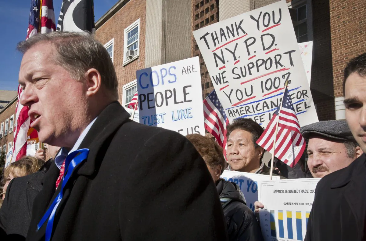 Retired NYPD Captain Joe Concannon speaks during a pro-police rally and press conference outside Queens Borough Hall, Tuesday, Jan. 13, 2015, in New York. Concannon is now the Republican candidate for city councilman from Queens. (AP Photo/Bebeto Matthews)