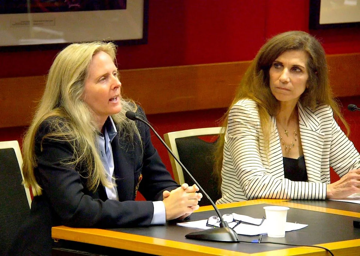 Professor Katrina Bramstedt, Ph.D., medical ethicist from Bond University (L) and Professor Maria Fiatarone Singh, M.D., a member of the Medical Advisory Board for Doctors Against Forced Organ Harvesting (R) provide expert commentary to an audience attending a screening of the film ‘Hard to Believe’ at N.S.W. Parliament House in Sydney on Oct. 28, 2015. (Epoch Times)