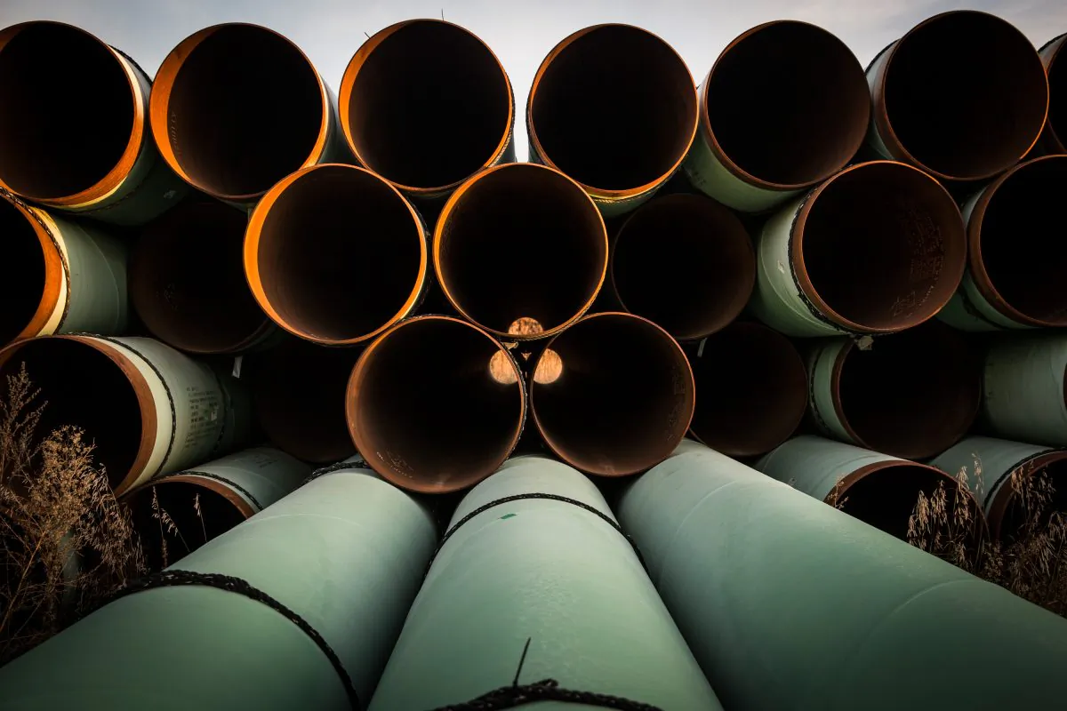 Miles of unused pipe, prepared for the proposed Keystone XL pipeline, sit in a lot on Oct. 14, 2014, outside Gascoyne, North Dakota. (Andrew Burton/Getty Images)