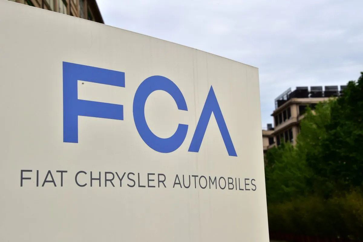 A picture shows the Fiat Chrysler Automobiles (FCA) logo at the entrance of the headquarters, on April 19, 2015 in Turin. (GIUSEPPE CACACE/AFP/Getty Images)