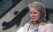 Tearful Relatives Identify Victims of Plane Crash