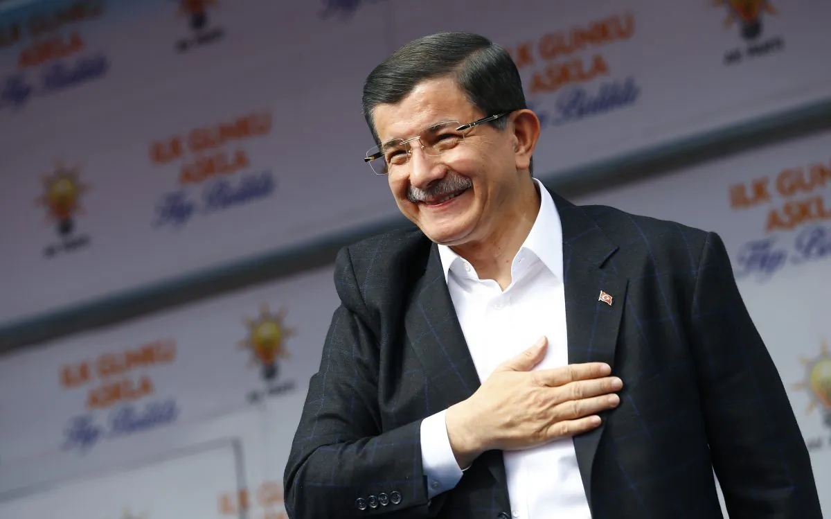 Turkish Prime Minister Ahmet Davutoglu salutes supporters during a rally of his Justice and Development Party (AKP), in Ankara, Turkey, on Oct. 31, 2015. (Umit Bektas/AP)