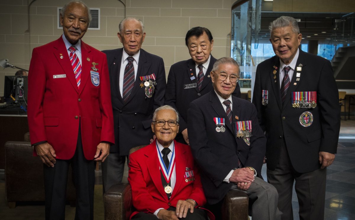 (L-R) Second World War veterans Bob Ashby, Neil Chan, Charles McGee, Leonard Wong, Frank Wong (now deceased), and George Chow, pictured on June 28, 2013, during a visit to Vancouver by some of the surviving members of the Tuskegee Airmen, a group of African-American military pilots who fought in WWII and who also faced discrimination. (Vincent L. Chan)