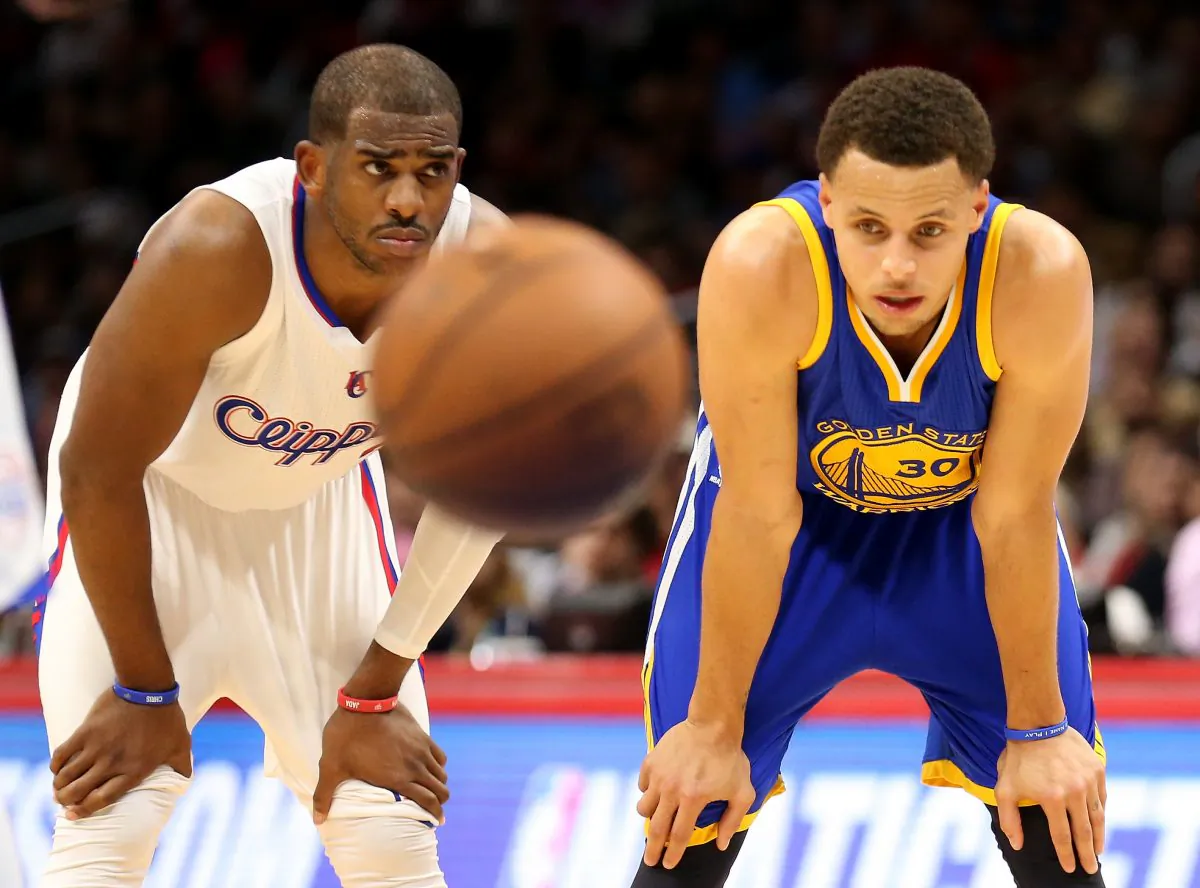 Chris Paul (L) and Stephen Curry are two of the best point guards in the NBA. (Stephen Dunn/Getty Images) 