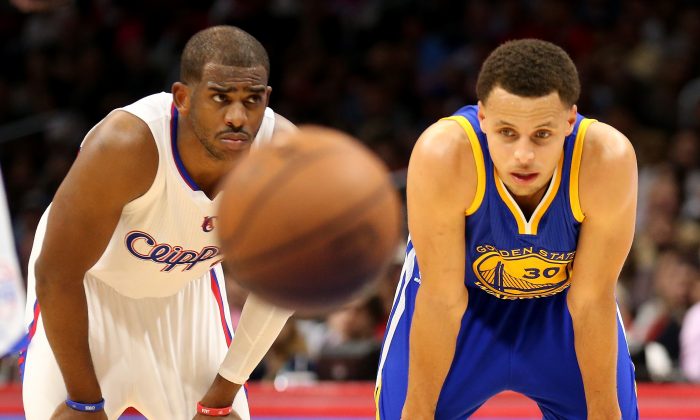 Chris Paul (L) and Stephen Curry are two of the best point guards in the NBA. (Stephen Dunn/Getty Images) 