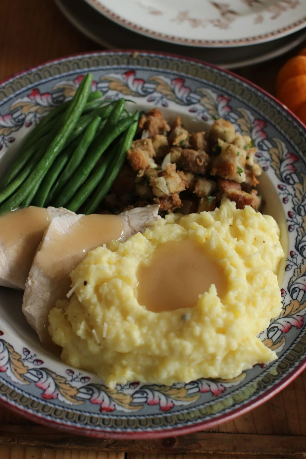 A touch of Parmesan cheese added to mashed potatoes turns this traditional side into something inspired with no extra work. (AP Photo/Matthew Mead)   