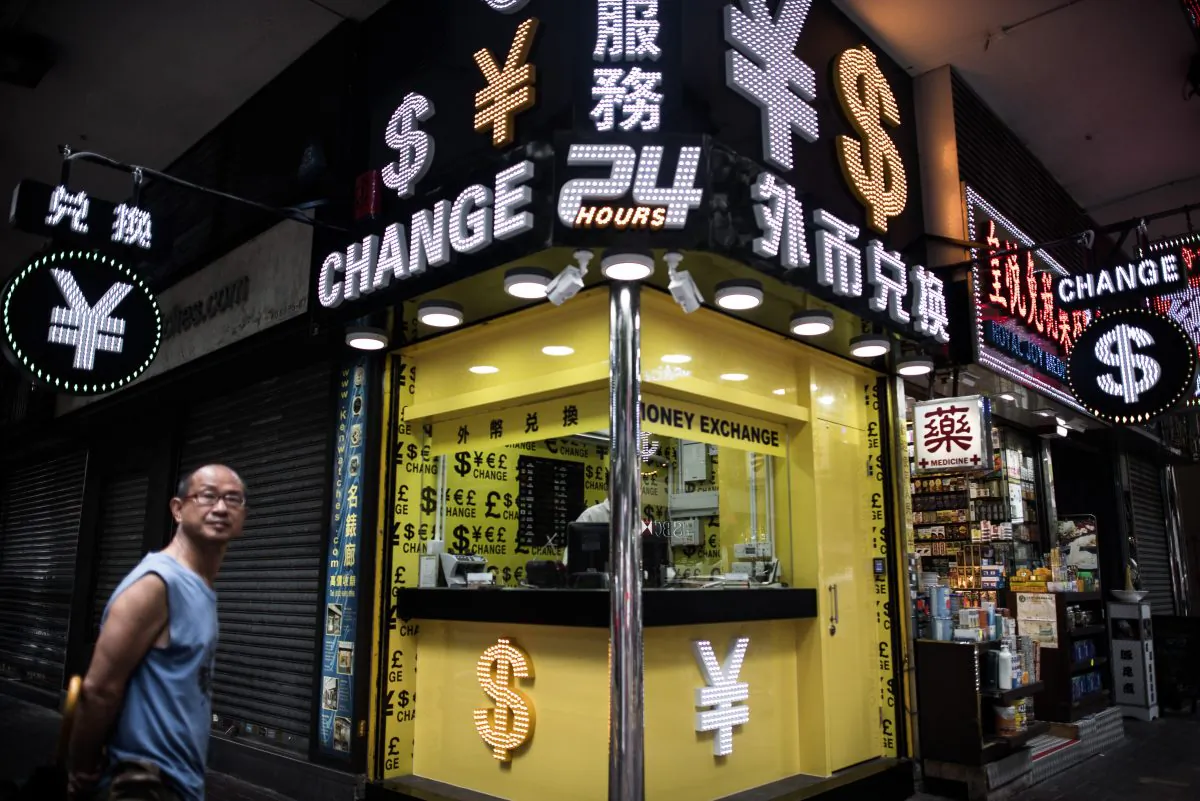 A foreign currency exchange booth in Hong Kong on Aug. 13, 2015. (Philippe Lopez/AFP/Getty Images)