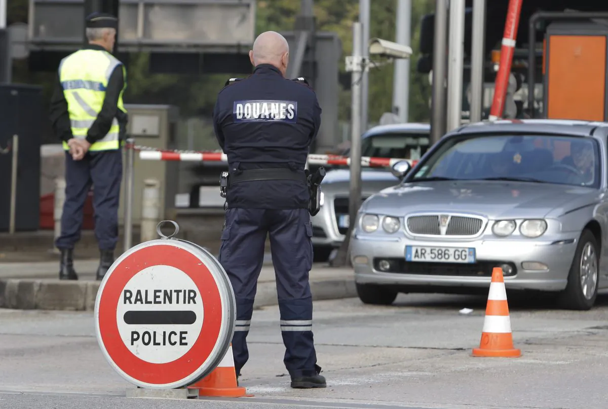 French border guards check vehicles, in La Turbie, France, on Nov. 6, 2015. (Lionel Cironneau/AP Photo)