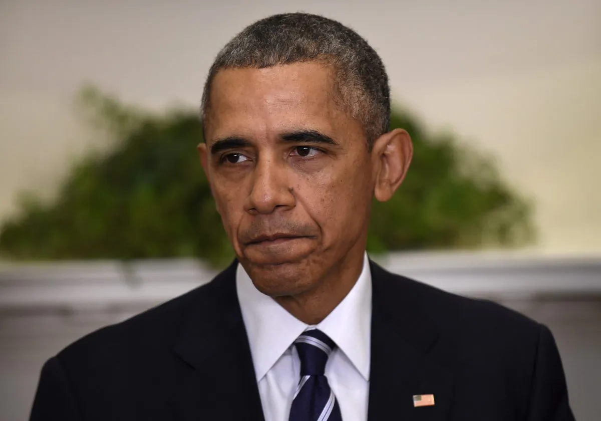 President Barack Obama pauses while making a statement on the Keystone Pipeline, Friday, Nov. 6, 2015, in the Roosevelt Room of the White House in Washington. The Obama administration has rejected Canadian energy giant TransCanada's application to build the Keystone XL pipeline. (AP Photo/Susan Walsh)