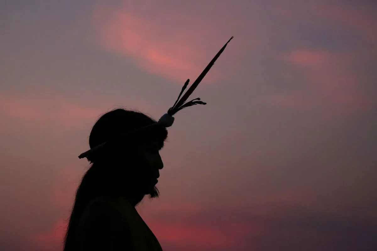 A Brazilian Xavante indigenous man attends the World Indigenous Games in Palmas, Brazil, on Oct. 22, 2015. Of the estimated 2,000 indigenous languages thought to have been spoken in pre-Columbian times in what is now Brazil, only around 160 survive today. Experts warn that as many of 40% of those remaining could be lost in the next few decades, as elders die off and young people get more access to television, the Internet and cell phones. (AP Photo/Eraldo Peres)
