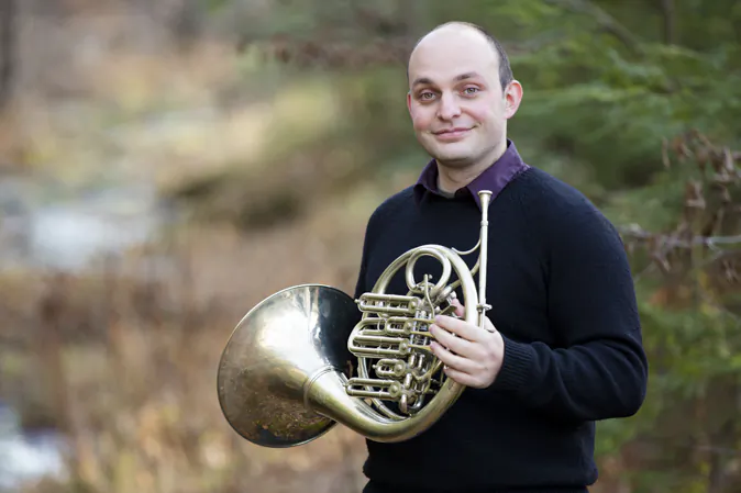 Through the principles of truthfulness, compassion, and tolerance, French horn player Georgi Boev found new appreciation for music. (Samira Bouaou/Epoch Times)
