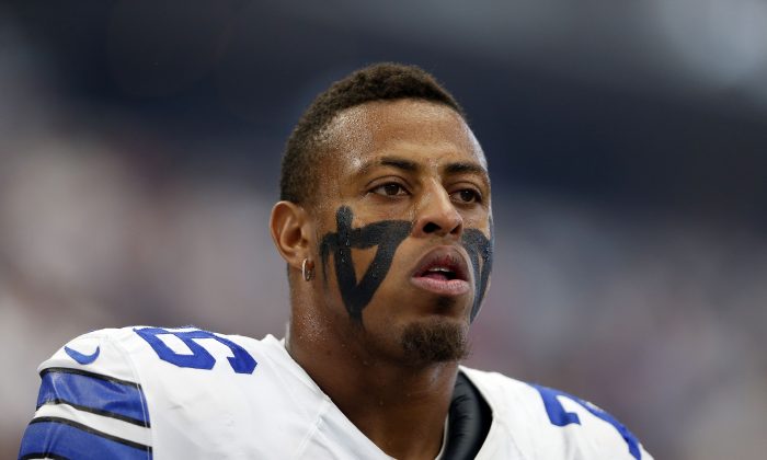 Defensive end Greg Hardy #76 of the Dallas Cowboys on the sidelines before a game against the New England Patriots at AT&T Stadium on October 11, 2015 in Arlington, Texas. (Photo by Christian Petersen/Getty Images)