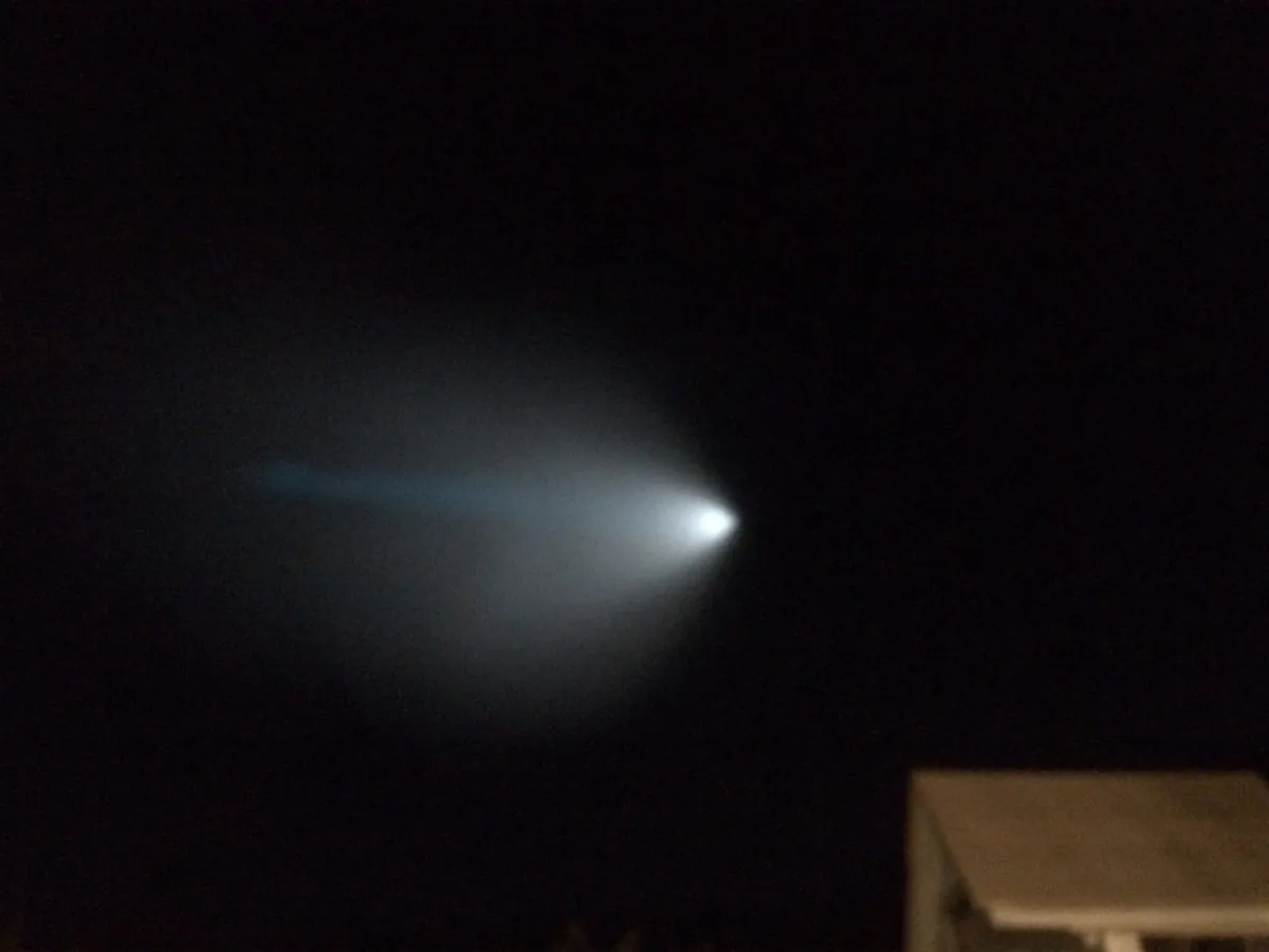 A light from a Navy unarmed missile is seen over Thousand Oaks, Calif., on Nov. 7, 2015. The Navy fired an unarmed missile from a submarine off the coast of Southern California on Saturday, creating a bright light that streaked across the state and was visible as far away as Nevada and Arizona. (Eddy Hartenstein/Los Angeles Times via AP)