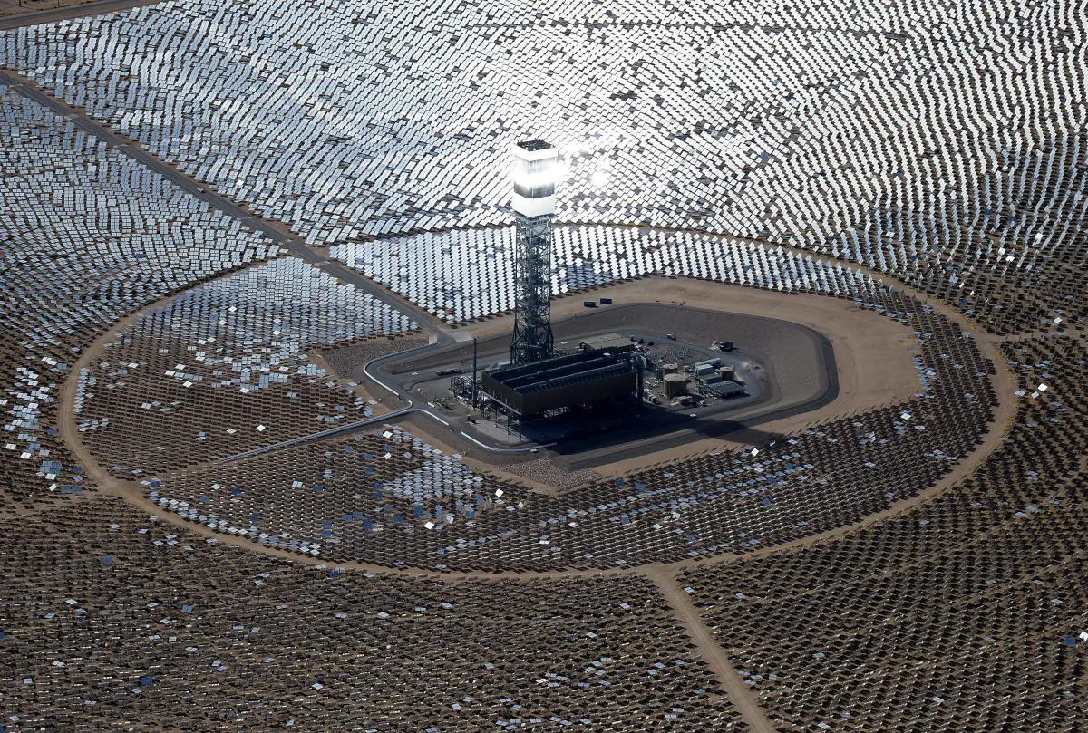 The Ivanpah Solar Electric Generating System in the Mojave Desert in California, near Primm, Nevada, on Feb. 20, 2014. The largest solar thermal power-tower system in the world, owned by NRG Energy, Google and BrightSource Energy, and formally opened in February 2014 in the Ivanpah Dry Lake, it uses 347,000 computer-controlled mirrors to focus sunlight onto boilers on top of three 459-foot towers, where water is heated to produce steam to power turbines providing power to more than 140,000 California homes. (Ethan Miller/Getty Images)