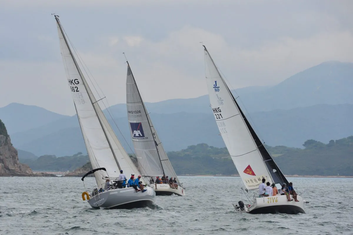 ‘Scrumpy’, ‘Bits & Pieces’ and ‘Jive’ head upwind during day-1 of the Hebe Haven Winter Series on Saturday Nov 7, 2015. (Bill Cox/Epoch Times)
