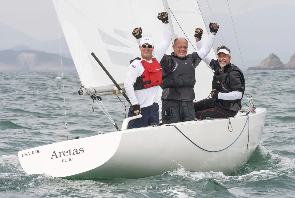 Skip Dieball and crew John McCl;ean and Jeff Eiber of ‘Aretas’ celebrate their win in the Etchells World Championships 2015 in Hong Kong on Saturday Nov 7, 2015. (2015 Etchells Worlds/Guy Nowell)