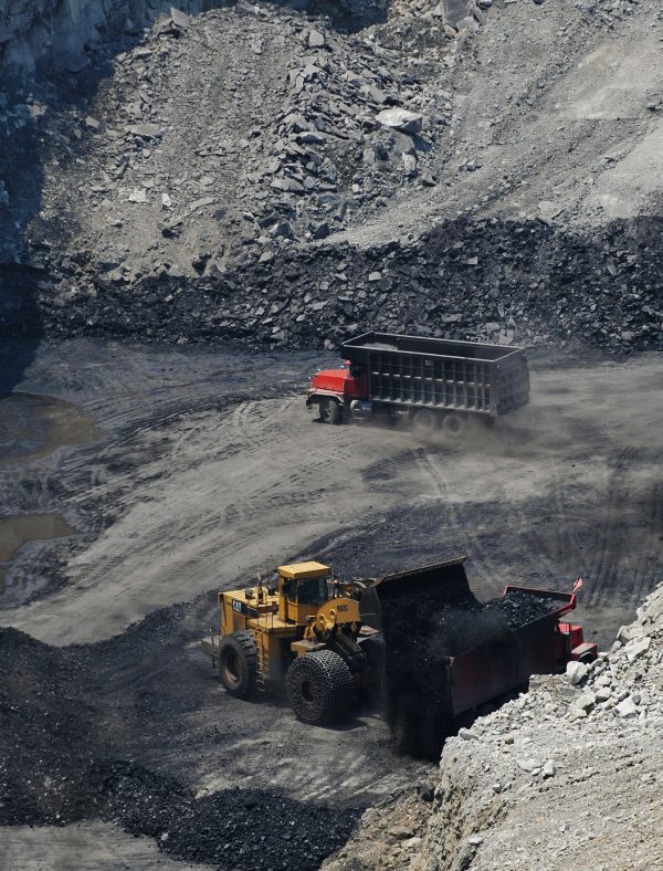 A June 12, 2008 photo shows coal being loaded onto a truck at a coal mine on top of Kayford Mountain in West Virginia. (Mandel Ngan/AFP/Getty Images)