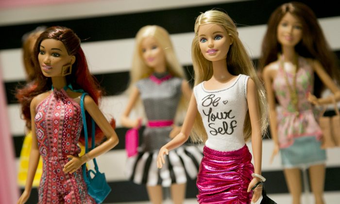 Barbie Fashionista Dolls from Mattel are displayed at the TTPM Holiday Showcase in New York on Sept. 29, 2015. The U.S. toy industry is expected to have its strongest year in over a decade. Richard Dickson, Mattel’s president and chief operating officer, told investors that he’s seeing “a lot of positive momentum” coming from its two biggest brands—Barbie and Fisher-Price. (AP Photo/Mark Lennihan)