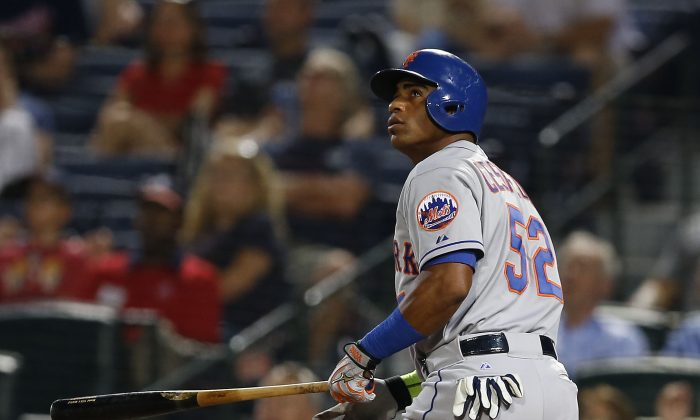 Yoenis Cespedes gave the Mets offense the punch they needed to win the NL East. (Mike Zarrilli/Getty Images) 