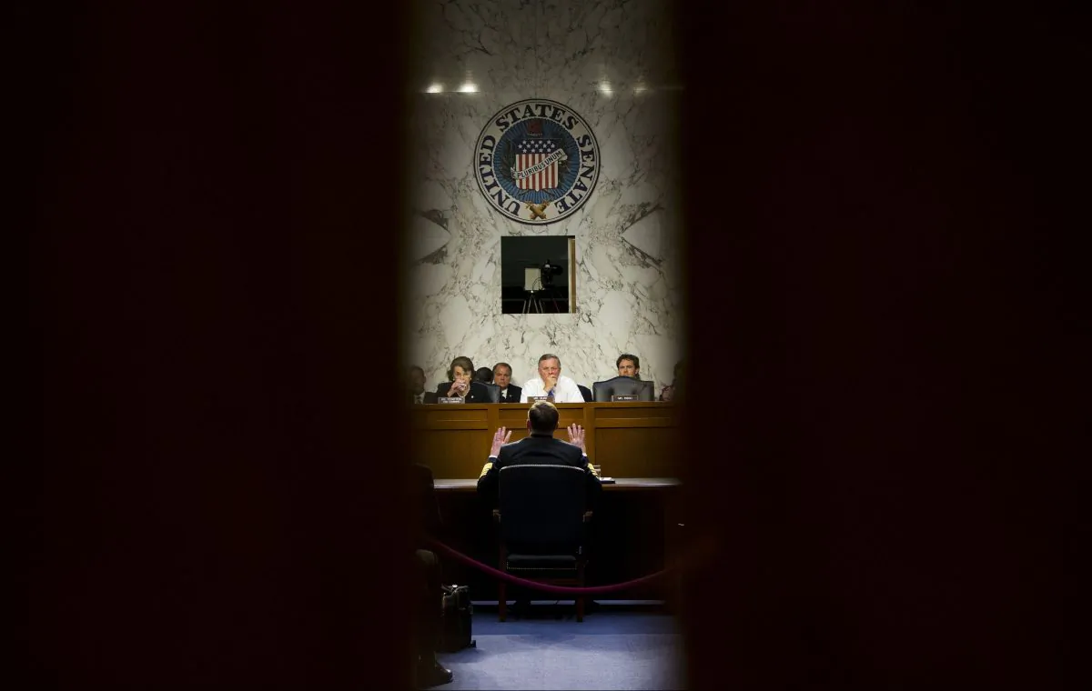 Senate Intelligence Committee Chairman Sen. Richard Burr (R-N.C.) (R) and Committee Vice Chair Sen. Dianne Feinstein (D-Calif.) listen as Director of the National Security Agency (NSA) Adm. Michael Rogers testifies on Capitol Hill in Washington, D.C., on Sept. 24, 2015. (AP Photo/Pablo Martinez Monsivais)