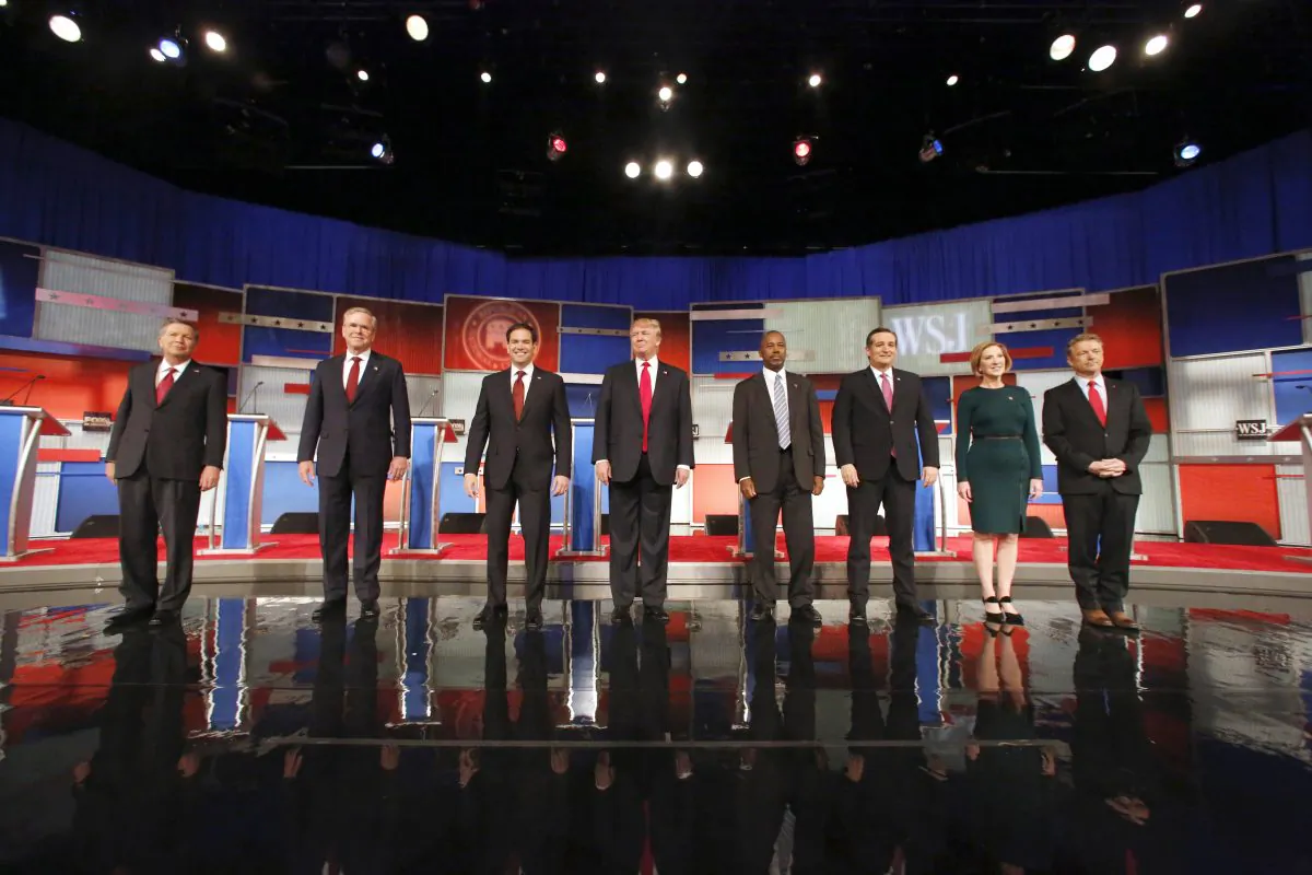 Republican presidential candidates John Kasich, Jeb Bush, Marco Rubio, Donald Trump, Ben Carson, Ted Cruz, Carly Fiorina, and Rand Paul take the stage before the Republican presidential debate at the Milwaukee Theatre, on Nov. 10. (AP Photo/Jeffrey Phelps)