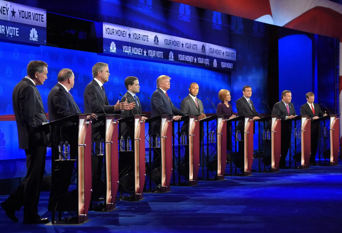 Then-2016 Republican presidential candidates (L-R) John Kasich, Mike Huckabee, Jeb Bush, Marco Rubio, Donald Trump, Ben Carson, Carly Fiorina, Ted Cruz, Chris Christie, and Rand Paul at the CNBC Republican presidential debate at the University of Colorado in Boulder, Colo., on Oct. 28, 2015. (AP Photo/Mark J. Terrill)