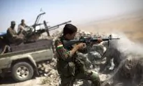 Kurdish Fighters Capture Military Air Base in Northern Syria