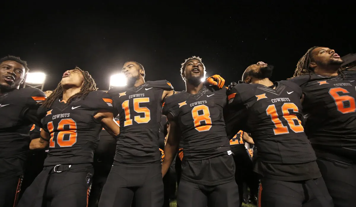 Oklahoma State routed TCU 49–29 yet haven't received much recognition from the CFP committee. (Brett Deering/Getty Images)