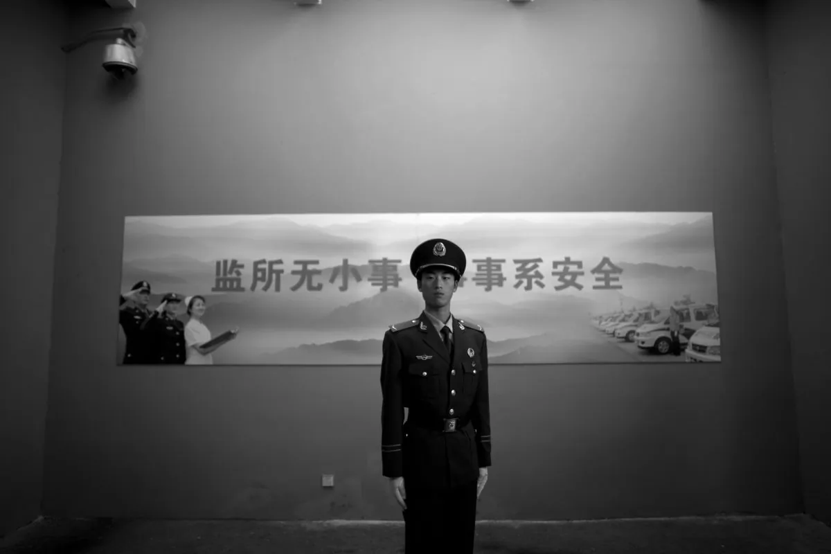 A Chinese paramilitary policeman stands guard at an entrance to the Number Two Detention Center in Beijing, China, on Oct. 25, 2012. A report by Amnesty International on Nov. 12, 2015 details the Chinese regime's practice of using torture to extract confessions from detainees. (AP Photo/Alexander F. Yuan)