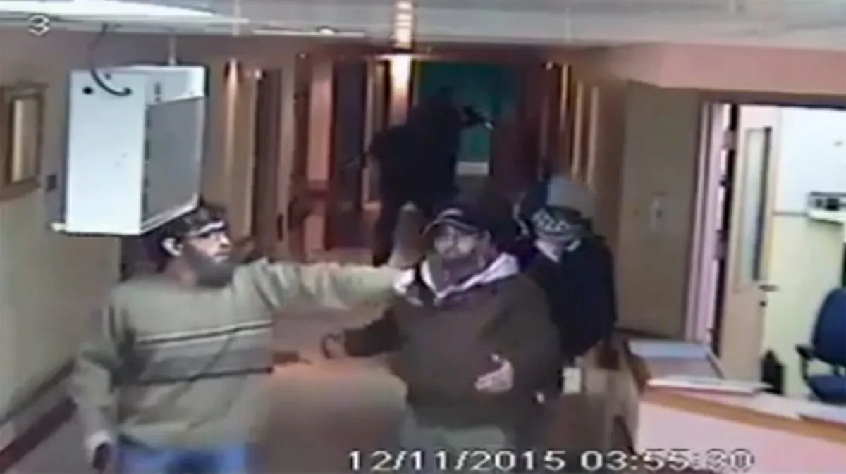 This image made from CCTV video released by Al-Ahli Hospital shows an arrest raid seeking a stabbing suspect by Israeli forces disguised in fake beards in Hebron on Thursday, Nov. 12, 2015. (Al-Ahli Hospital via AP)