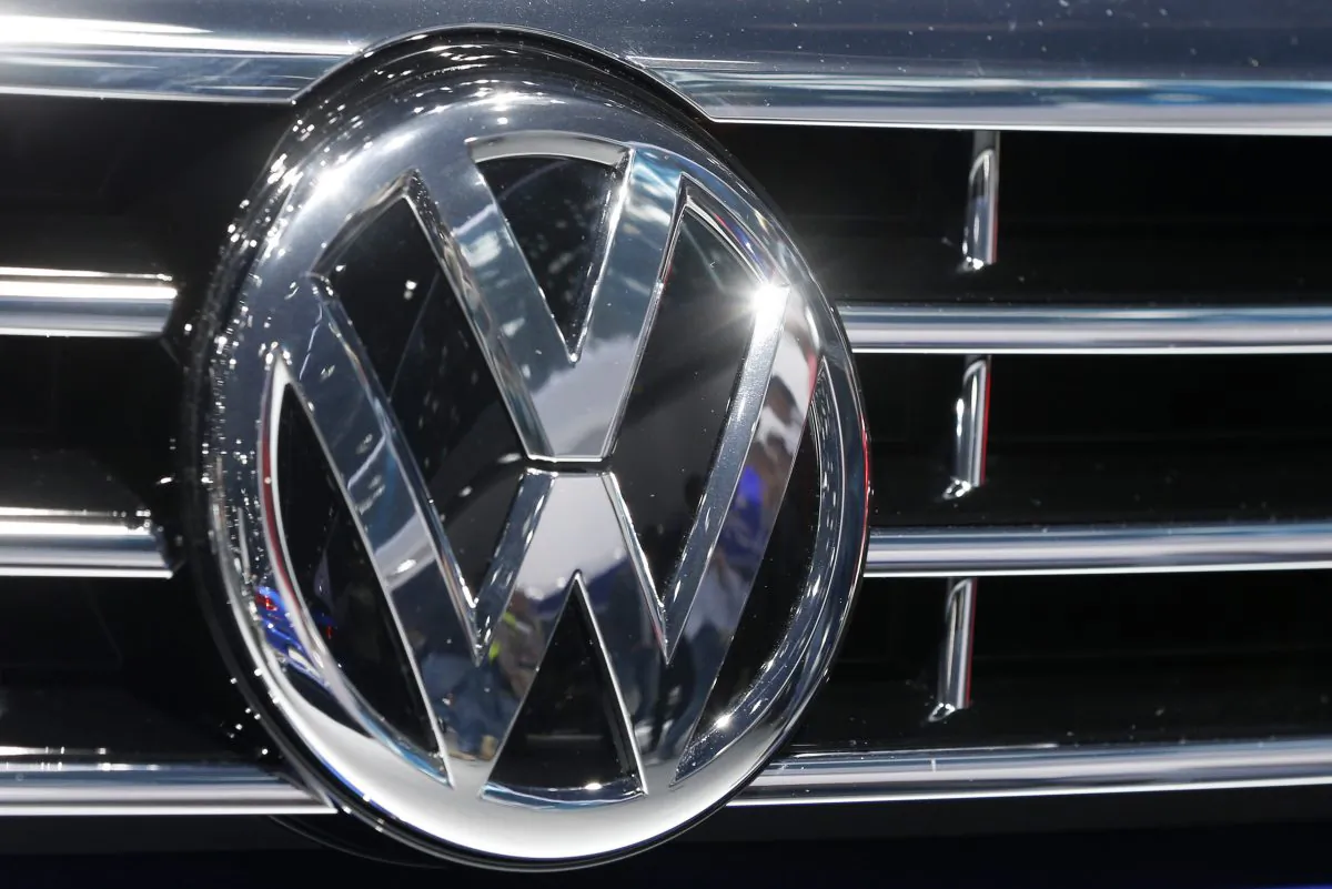 The Volkswagen logo of a car is photographed during a car show in Frankfurt, Germany on Sept. 22, 2015. (Michael Probst/AP Photo)