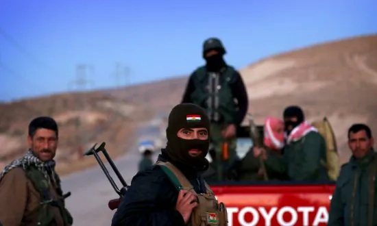 Kurdish Forces Recapture Militant-Held Towns in Iraq, Syria